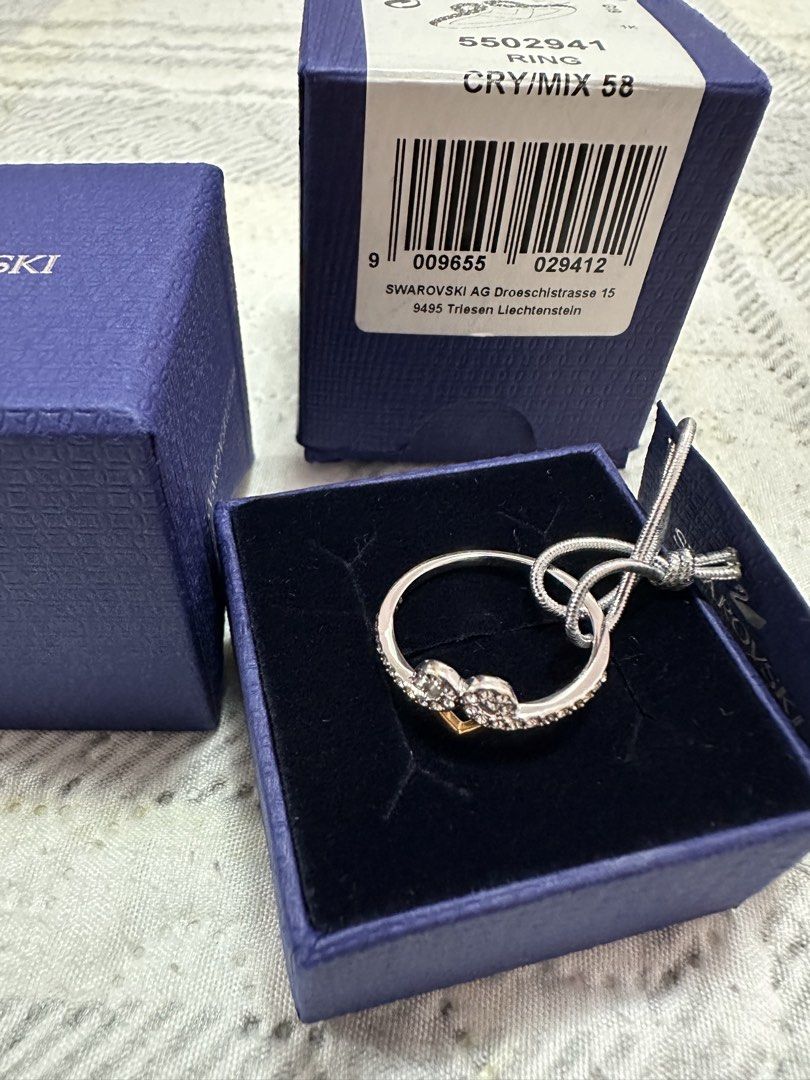 Swarovski Ring 5502941 CRY/MIX 58 (Category: Rings) located in Pasig City. Submitted by sandy120913 (Listing ID 1435420789, Image 3). Description: - Authentic Swarovski ring - Heart design with crystals and gold-tone accents - Ring size: 58 - Includes original box, tag, and packaging - Perfect for gifting or collecting.
