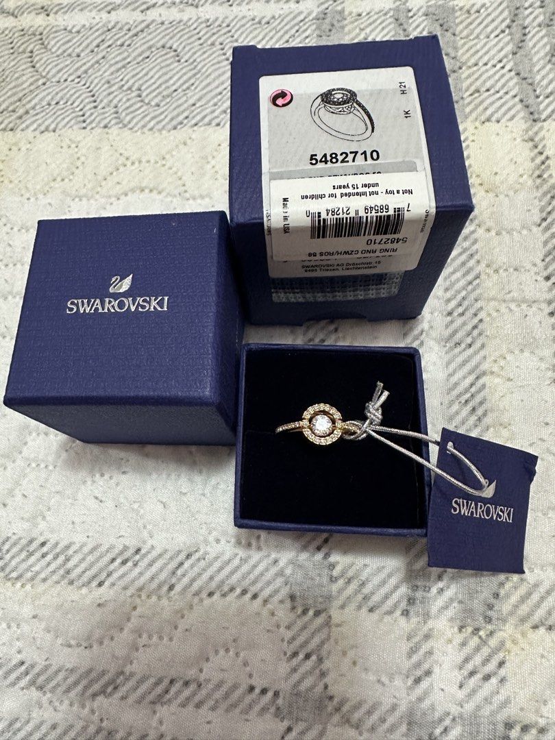 Swarovski Ring RND CZW/ROS 58 (Category: Rings) located in Pasig City. Submitted by sandy120913 (Listing ID 1435419975, Image 1). Description: - Genuine Swarovski ring - Rose Gold in color - Ring size: 58 - Features a clear, round center crystal - Surrounded by smaller crystals - Comes with original box and tag.