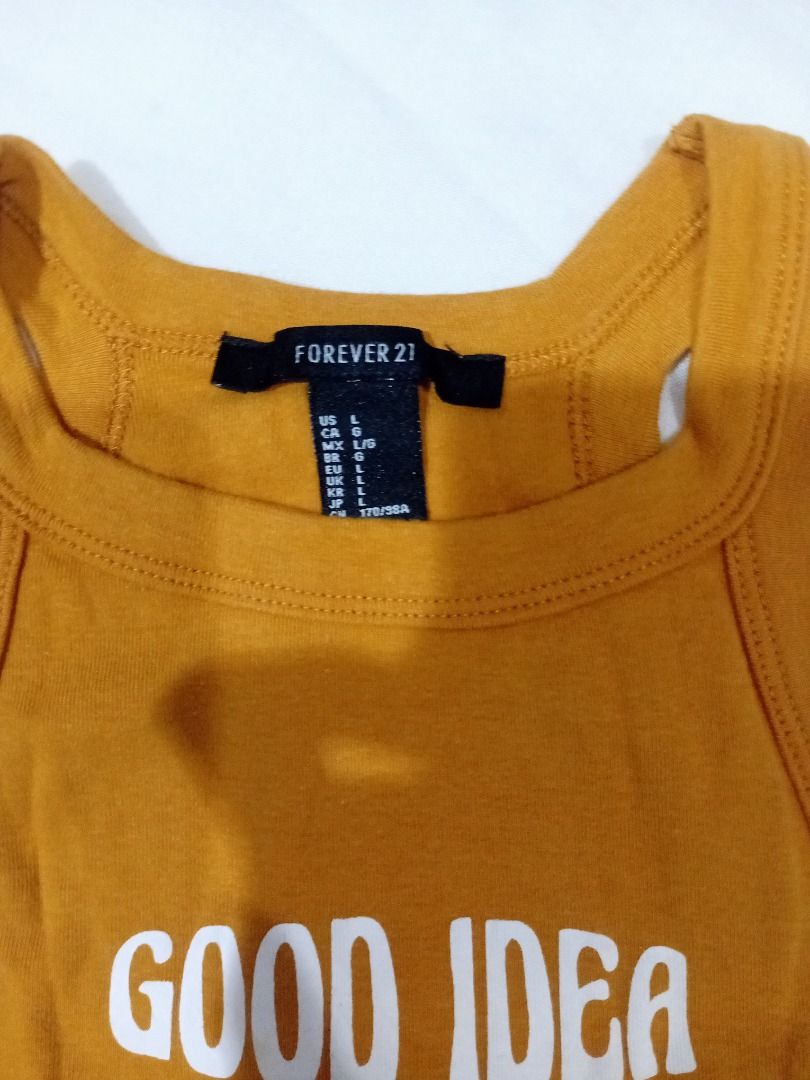 Tank Top for SALE!!! (Category: Sleeveless) located in Muntinlupa City. Submitted by sellthingsph_ (Listing ID 1435414410, Image 3). Description: All were only used once. Sizes indicated in the photos. F21 Dark Orange Tank Top - 50 Brown Tank Top - 30 Light Brown Tank Top - 30 Yellow Sleeveless Top - 50.
