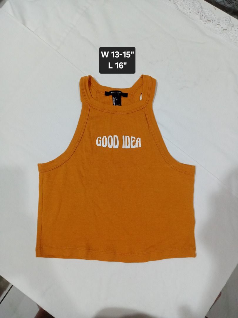 Tank Top for SALE!!! (Category: Sleeveless) located in Muntinlupa City. Submitted by sellthingsph_ (Listing ID 1435414410, Image 2). Description: All were only used once. Sizes indicated in the photos. F21 Dark Orange Tank Top - 50 Brown Tank Top - 30 Light Brown Tank Top - 30 Yellow Sleeveless Top - 50.