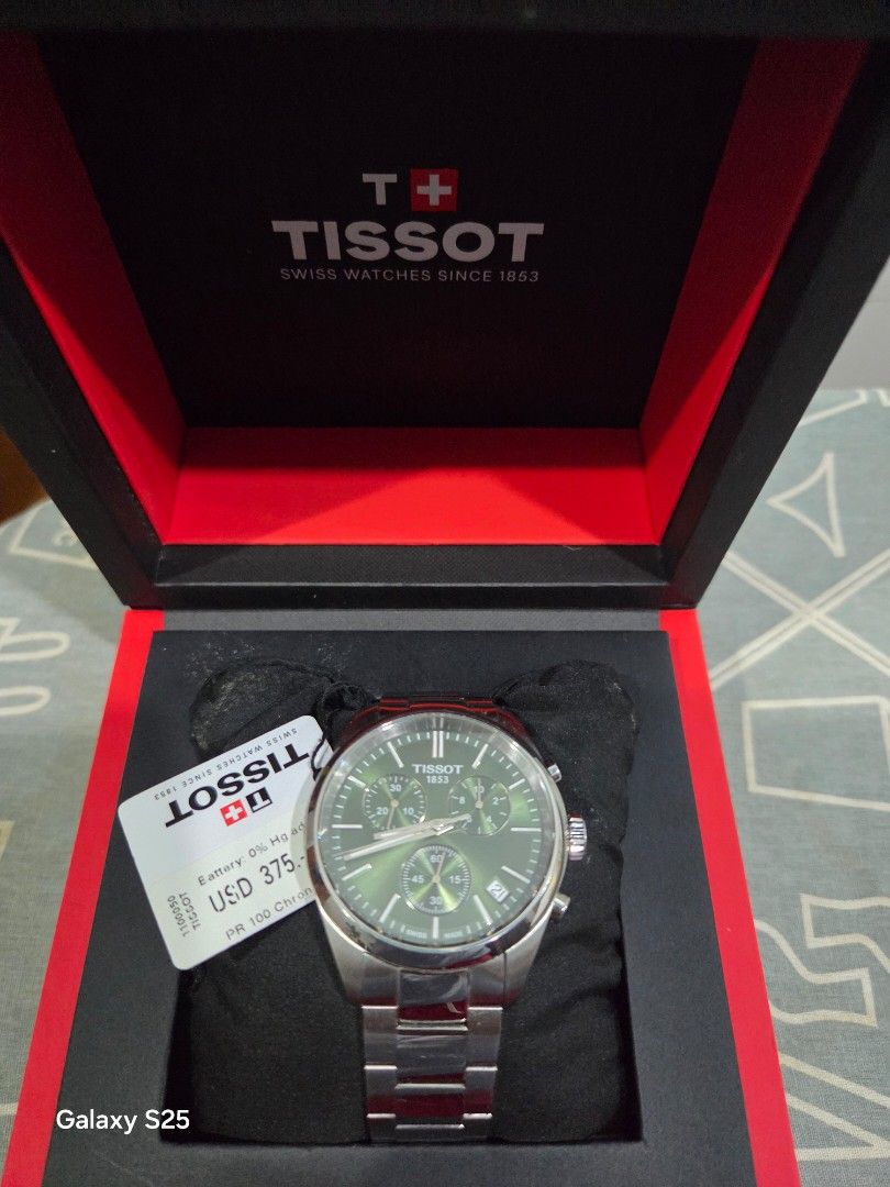 Tissot Chronograph Watch (Category: Luxury Watches) located in Dasmarinas. Submitted by beab4th.beab4th (Listing ID 1435463270, Image 1). Description: - Tissot watch - Green dial - Stainless steel bracelet - Chronograph subdials - Date display - Includes original box and tag - Tag price: USD 375 - Perfect for everyday wear.