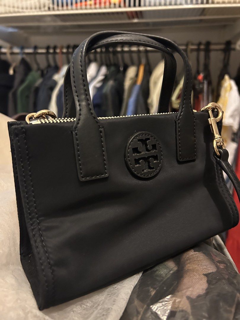 Tory Burch Ella Nylon Mini Tote (Category: Luxury Bags & Wallets) located in Quezon City. Submitted by jhiabigail (Listing ID 1435476390, Image 3). Description: Guaranteed Authentic. Bought from Pasabuy / Canada. No issues / defects. Looks good as new. Slightly nego. Metro Manila.