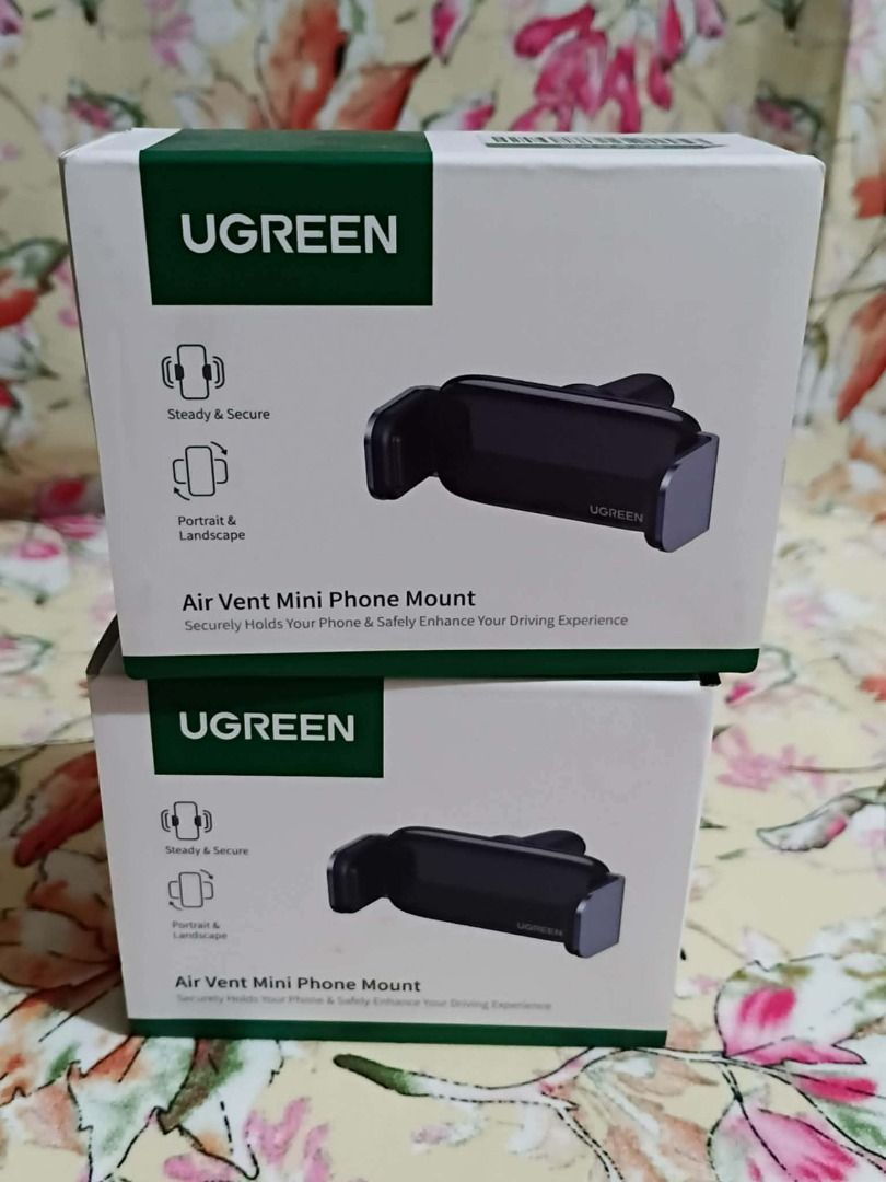 UGREEN Air Vent Mini Phone Mount (Category: Mounts & Holders) located in Manila. Submitted by paulaaa_c (Listing ID 1435361908, Image 1). Description: -Steady & Secure -Portrait & Landscape -Securely Holds Your Phone & Safely Enhance Your Driving Experience PRODUCT HIGHLIGHTS: Condition: 100% Brand New Quality: Premium / High Quality Warranty: With Replacement Warranty for peace of mind Availability: Ready stock for same-day delivery!.