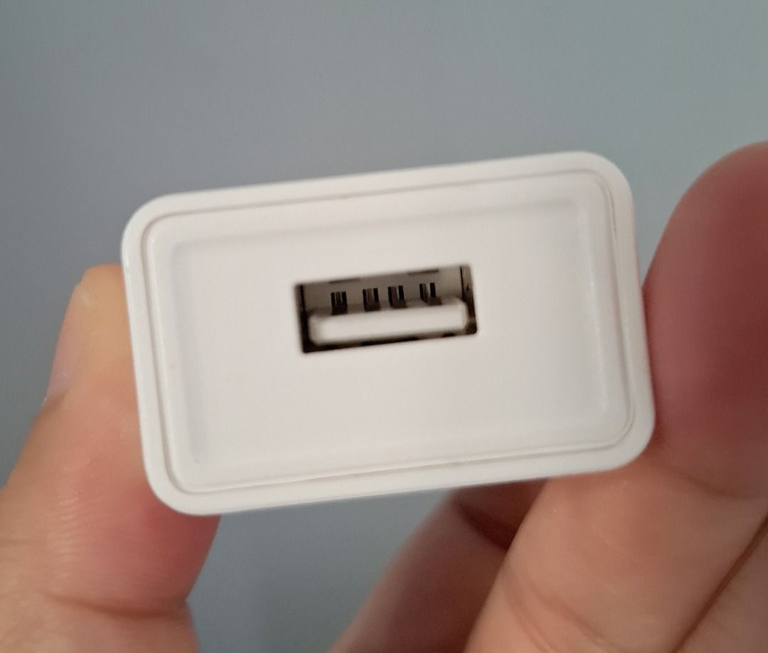 USB Adapter/Charger (USA-style plug, cannot be used with 3-pin Singapore power outlets)