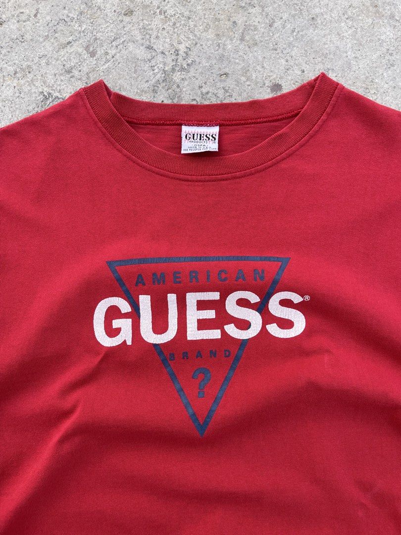 Vintage Guess Boxy tee shirt (Category: Tshirts & Polo Shirts ) located in Santa Rosa. Submitted by arvintage.ph (Listing ID 1435342911, Image 1). Description: Tagged: One Size Fits All on tag, fits Medium Width 22” | Length 27.5” Condition: Great Issue(s): Minimal crackprint.