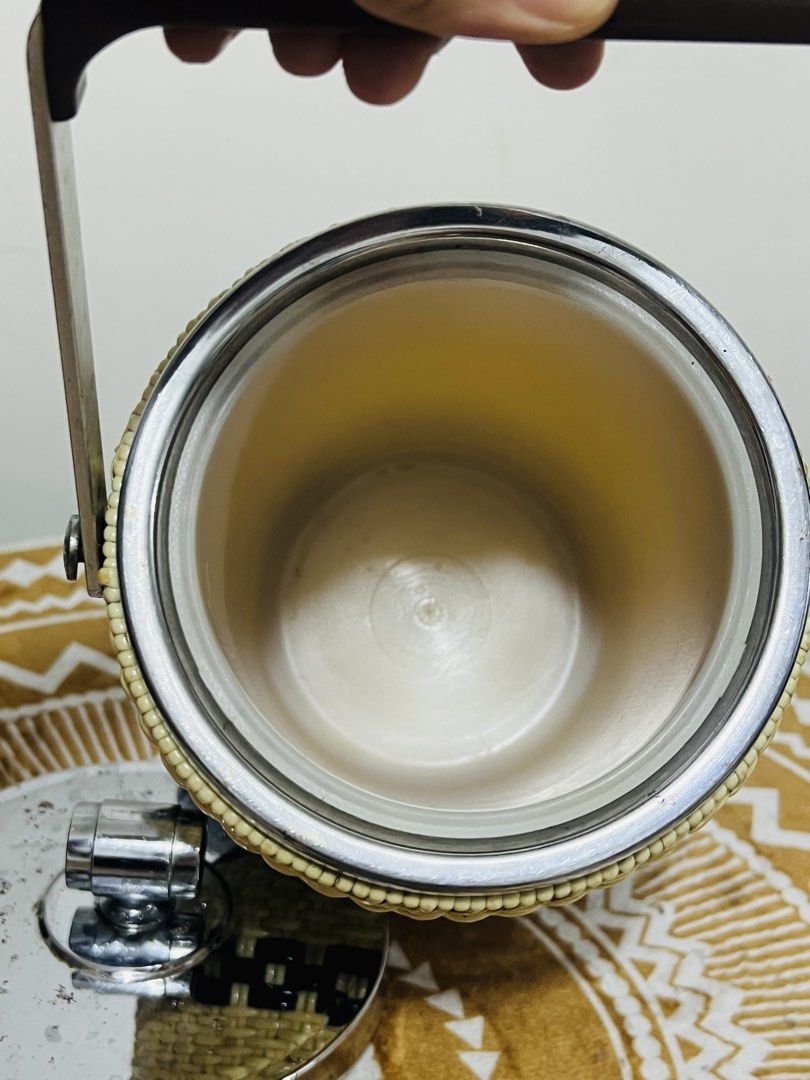 Vintage Japan footed Ice bucket (Category: Other Kitchenware & Tableware) located in Cavite. Submitted by wishie_collects (Listing ID 1435472189, Image 3). Description: This ice bucket has a mid century design, woven from beige and black vinyl. It’s also great for storing cookies and other sweets! Approximately 14 cm in diameter; 25 cm in height.