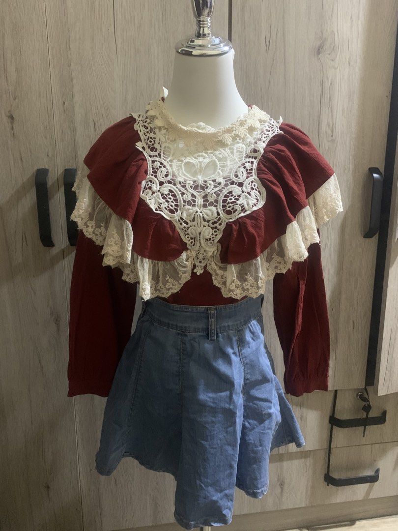 Vintage Red Lace Blouse (Category: Blouses) located in Cavite. Submitted by archimage (Listing ID 1435379257, Image 1). Description: - Red blouse with white lace detailing - size xs - s - Features long sleeves - Unique layered design - Adds vintage charm - Flaws: few loose threads pero super hindi kita. Looks good as new .