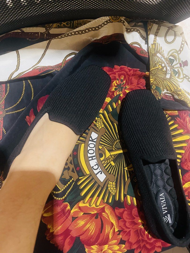 VIVAIA Black Knit Loafers (Category: Loafers) located in Cavite. Submitted by authenticfindsbyging (Listing ID 1435381193, Image 2). Description: - VIVAIA black loafers - Knit design - Comfortable insole - Easy slip-on style - Perfect for everyday wear - VIVAIA logo visible.