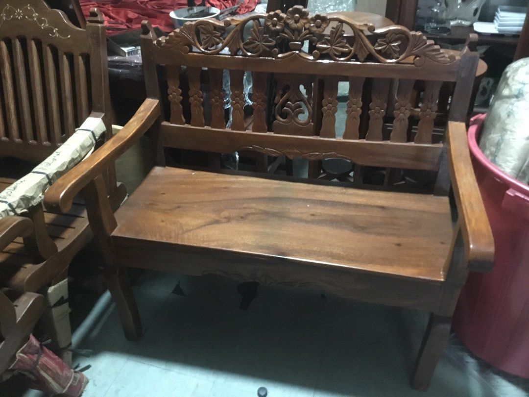 Wooden Bench with Carved Backrest (Category: Chairs) located in Manila. Submitted by roberto.enriquez (Listing ID 1435409108, Image 2). Description: - Wooden bench with intricate carvings - Features armrests - Rich, warm wood tone - Sturdy and well-constructed - Suitable for indoor use - Classic design Length 39 Width 19 inches Height 40.
