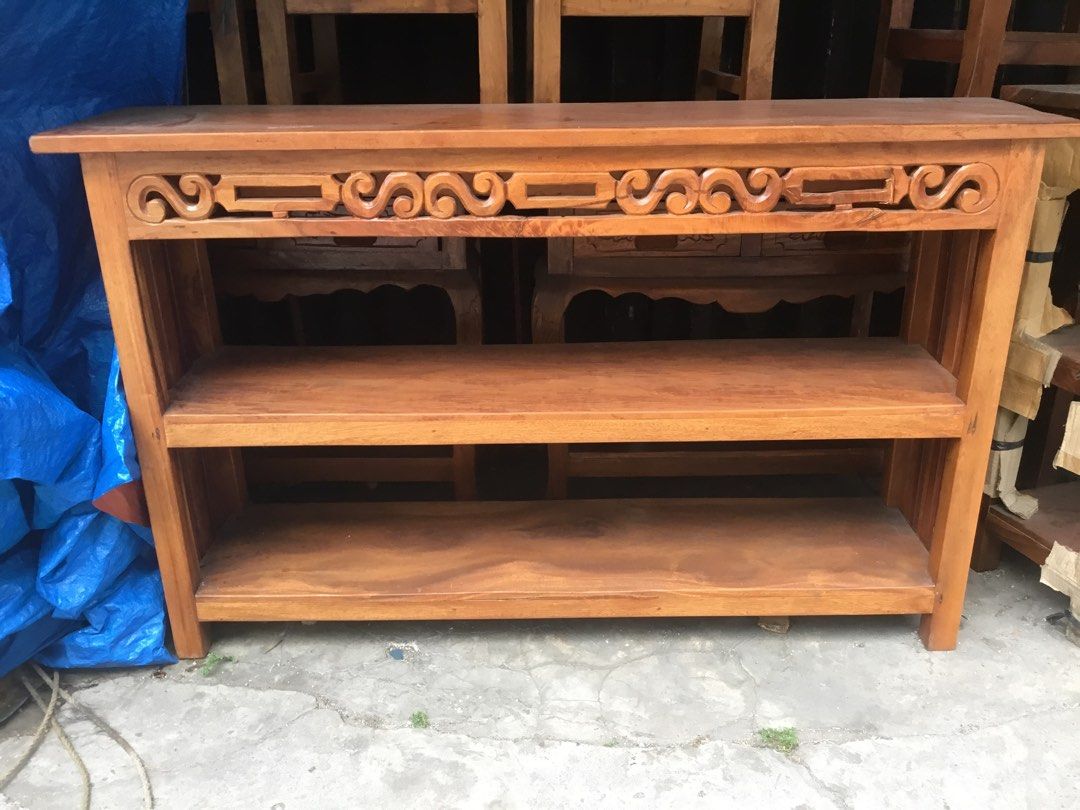 Wooden Console Table with Shelves (Category: Tables & Sets) located in Manila. Submitted by roberto.enriquez (Listing ID 1435429520, Image 2). Description: - Wooden console table - Three shelves for storage - Decorative carved design - Natural wood finish - Ideal for entryways, living rooms, or hallways - Sturdy and classic design Length 57 Width 14 inches Height 35.