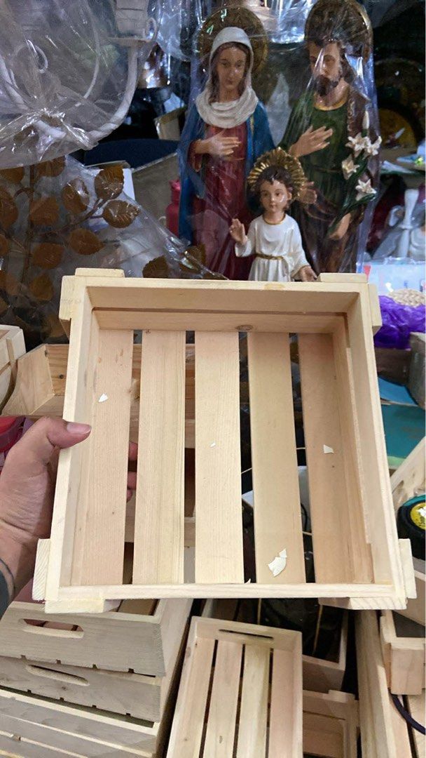 Wooden Crate (Category: Storage Boxes & Baskets) located in Quezon City. Submitted by ivy191995 (Listing ID 1435475005, Image 2). Description: - Wooden crate - Rectangular shape - Vertical slats - Handle for carrying - Natural wood color - Perfect for storage or display - Ideal for home or shop.