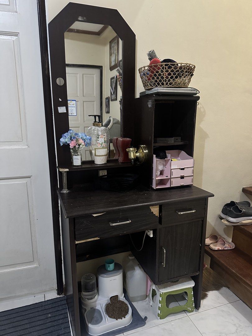Wooden Dressing Table with Mirror (Category: Tables & Sets) located in Paranaque City. Submitted by moonbea (Listing ID 1435454218, Image 3). Description: - things inside not included -Wooden dressing table with mirror - Includes a drawer, cabinet, and shelves for storage - Dark brown finish - Built-in mirror - Additional side storage - Built in lamp (changeable bulb) .