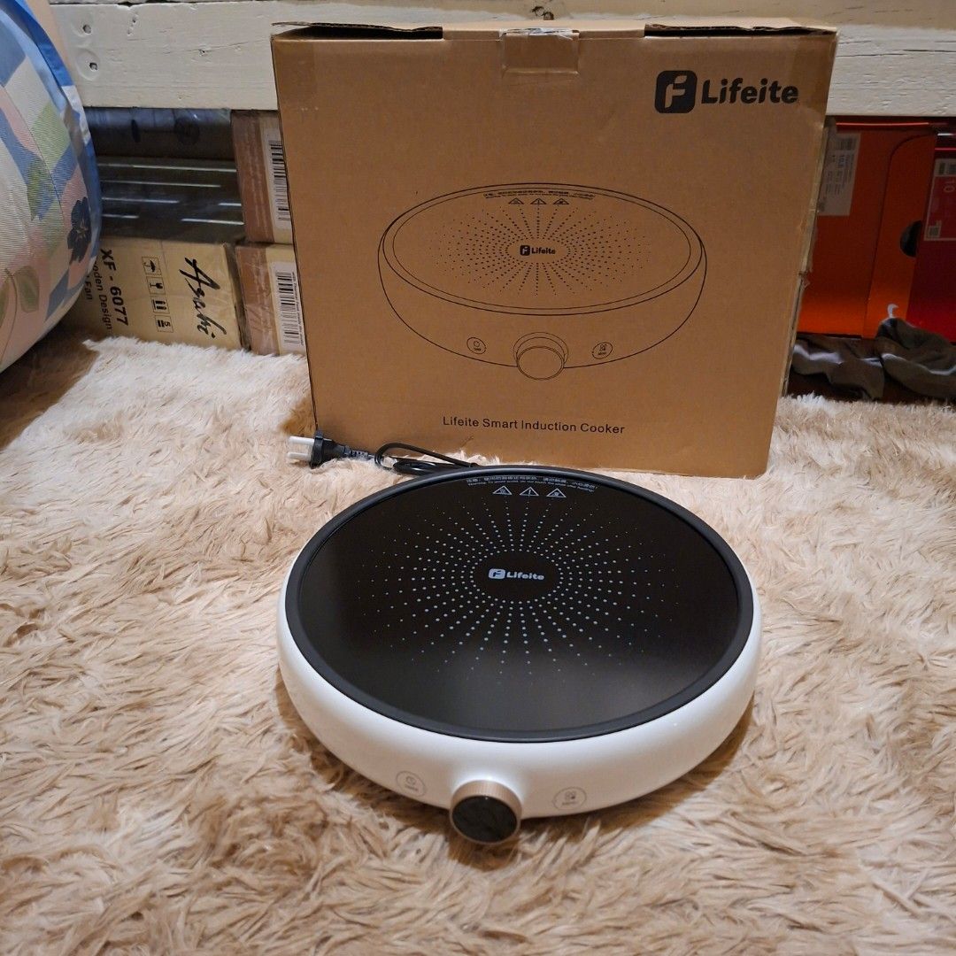 Xiaomi oled knob Lifeite Smart Induction Cooker (Category: Cookers) located in Pasig City. Submitted by mr.bargaindeal (Listing ID 1435396162, Image 1). Description: - Lifeite Smart Induction Cooker - Stylish white and black design - Central cooking surface - Features a control knob and indicator lights - Compact and modern appliance - Comes with the original box.