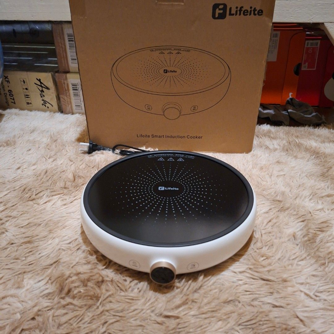 Xiaomi oled knob Lifeite Smart Induction Cooker (Category: Cookers) located in Pasig City. Submitted by mr.bargaindeal (Listing ID 1435396162, Image 2). Description: - Lifeite Smart Induction Cooker - Stylish white and black design - Central cooking surface - Features a control knob and indicator lights - Compact and modern appliance - Comes with the original box.