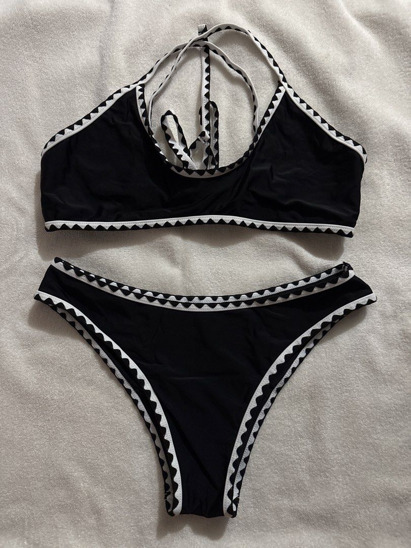 Zaful Black Bikini - Size M (Category: Bikinis & Swimsuits) located in Makati City. Submitted by ell_declutter (Listing ID 1435381435, Image 1). Description: - ZUI black bikini bottom - Size: M - Made in China - Features white scalloped trim - Smooth, dark fabric.