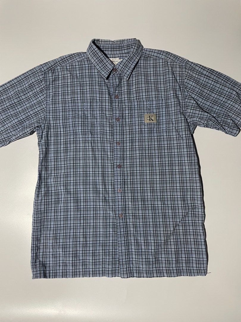 90s Calvin Klein check flannel Polo (Category: Tshirts & Polo Shirts ) located in Las Pinas. Submitted by mistyger. (Listing ID 1437114160, Image 1). Description: Colorate 10/10 No issue Wash narin po gagamitin nalang 100% cotton.