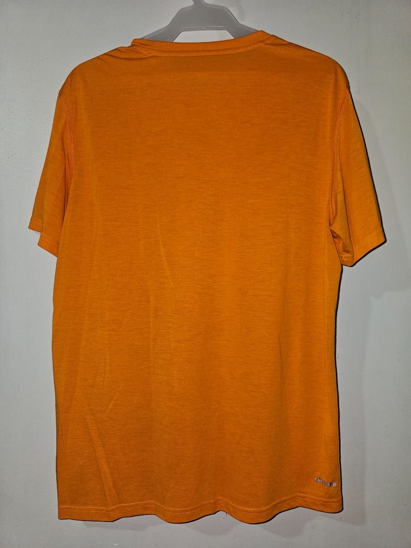 Adidas Climalite Orange T-shirt (Category: Activewear) located in Pasig City. Submitted by cosmicdeer_01 (Listing ID 1437137151, Image 1). Description: W: 20 in L: 27 in Meetups: SM Marikina, Ayala Malls Feliz, Gateway Cubao, SM Megamall.