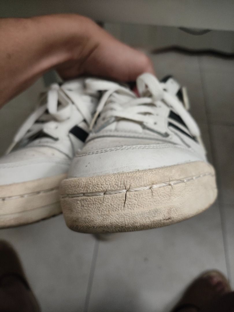 Adidas Forum Low (Category: Sneakers) located in Caloocan City. Submitted by oddly8940 (Listing ID 1437189799, Image 2). Description: Good as new, needs cleaning, light cracks. (With strap and box) Slight nego. +sf.