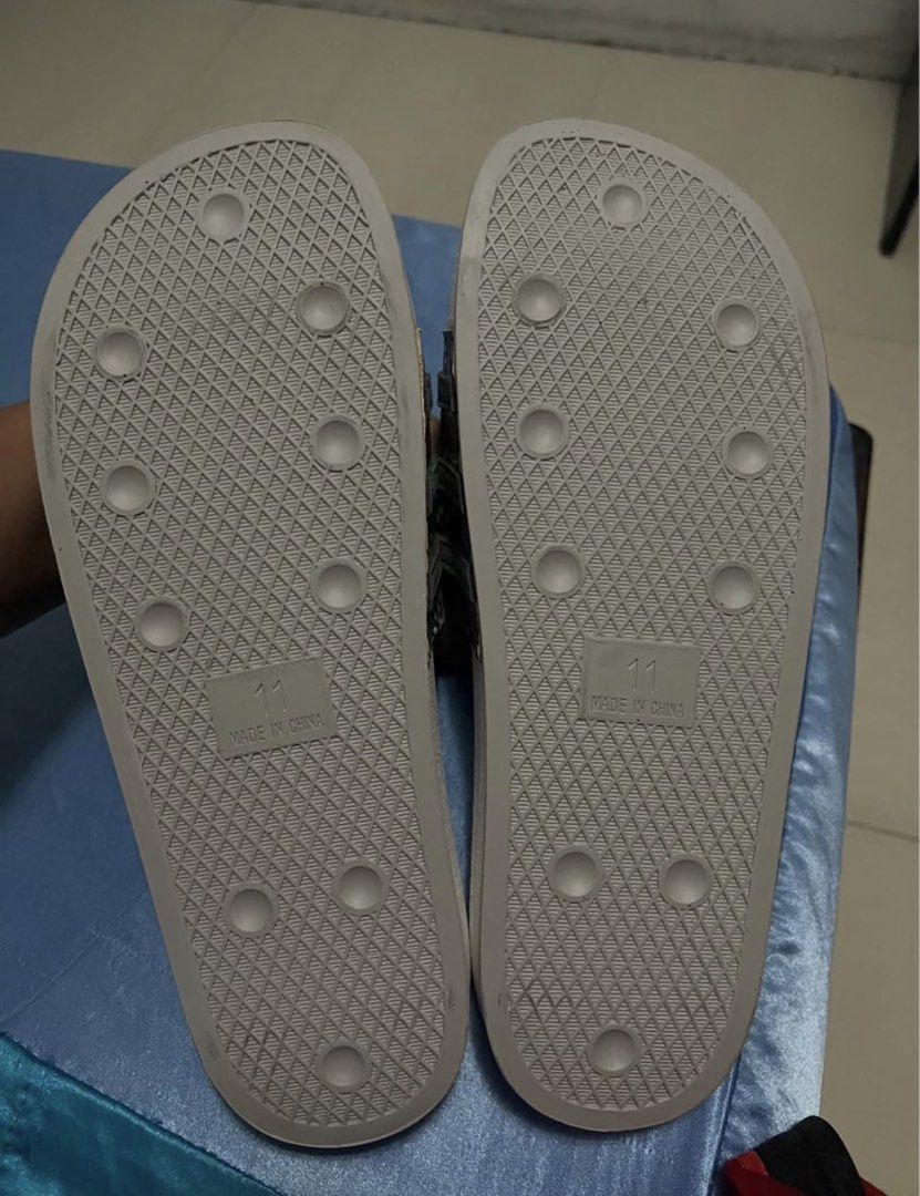 Adidas Slides Snake Print Size 11 (Category: Slippers & Slides) located in Quezon City. Submitted by jdlshop (Listing ID 1437134029, Image 3). Description: - Adidas slides - Snake print straps - White sole with Adidas logo - Size 11 - Unworn.