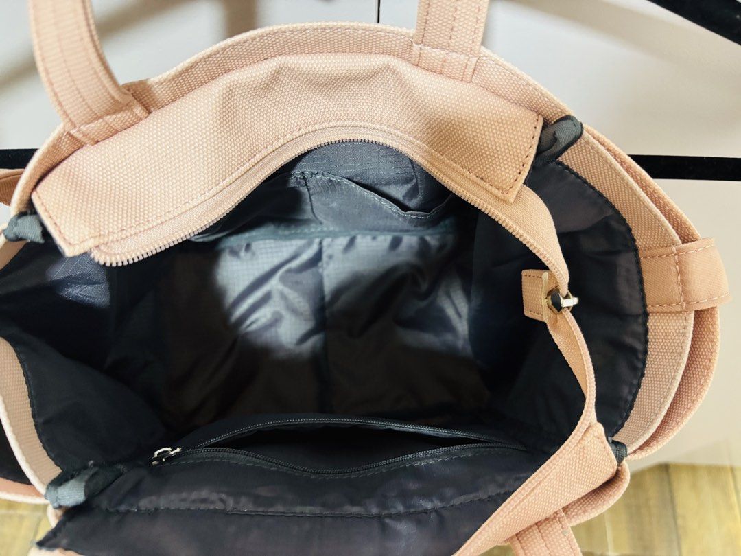 Anello (Category: Tote Bags) located in Batangas. Submitted by aveena0413 (Listing ID 1437130046, Image 3). Description: Anello waterproof bag – peach color 🍑 Used once only, still in excellent condition. Bought in Japan 🇯🇵 Super lightweight and spacious. Perfect for everyday use, travel, or school.”.