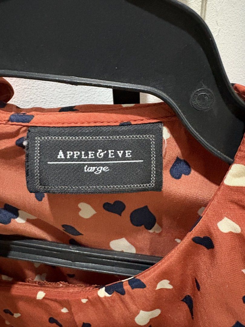 Apple & Eve Heart Print Top - Large (Category: Blouses) located in Las Pinas. Submitted by jclb13 (Listing ID 1437123895, Image 3). Description: - Apple & Eve top - Adorable heart print - Peter Pan collar - Layered detailing - Size: Large - Short sleeves - Button closure at back - Color: Reddish-orange.
