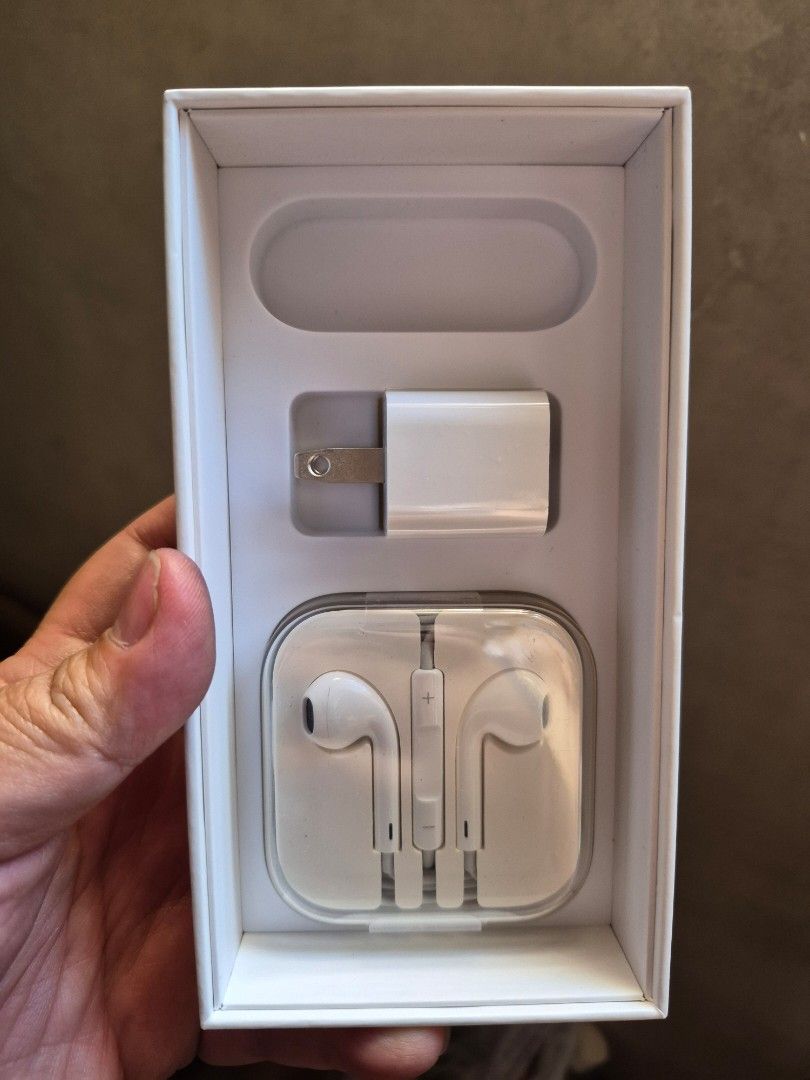Apple Wired EarPods with Charger and Box (Category: Earphones) located in Caloocan City. Submitted by sassy1013 (Listing ID 1437029351, Image 1). Description: - Apple Wired Earphones - Includes USB power adapter (US plugs) - Comes with the original box - Perfect as a replacement or spare - Ready to use.