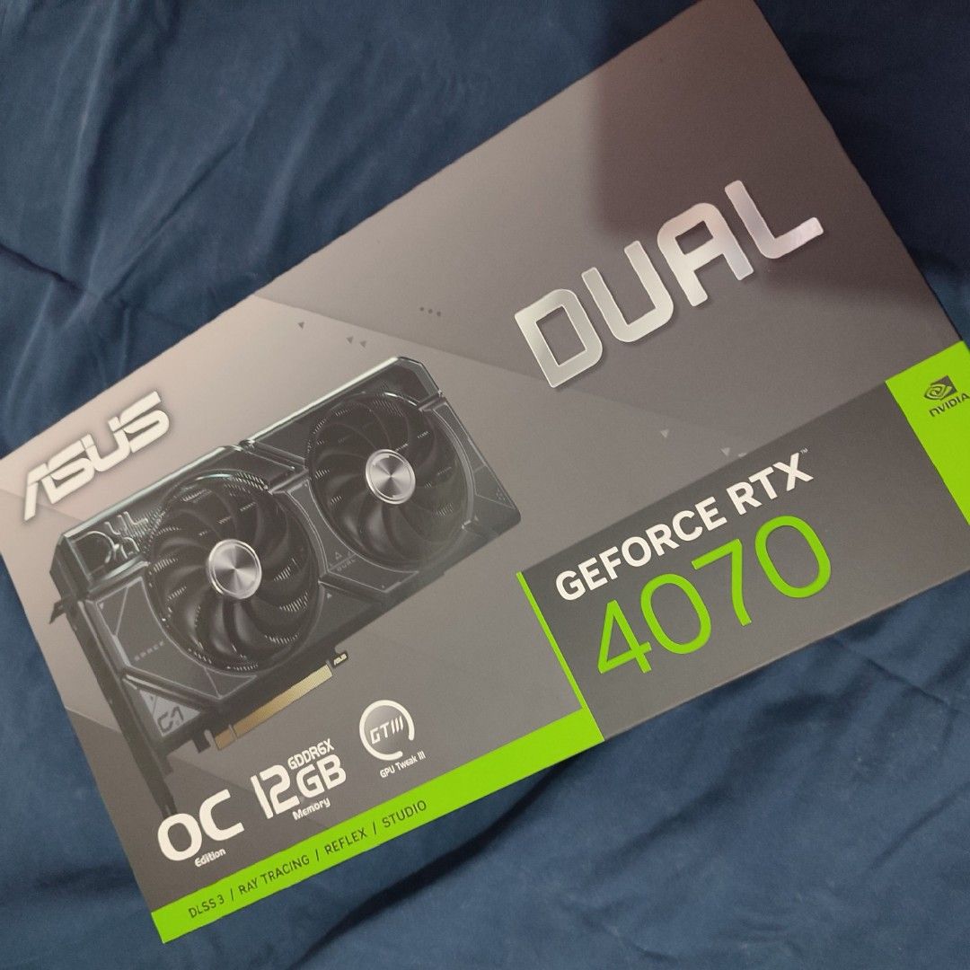 ASUS GeForce RTX 4070 Dual OC 12GB (Category: Computer Parts) located in Makati City. Submitted by genard_ (Listing ID 1437074000, Image 3). Description: - ASUS GeForce RTX 4070 Dual OC 12GB - 12GB GDDR6X memory - Ray tracing and DLSS support - Dual-fan cooling - HDMI and DisplayPort outputs.