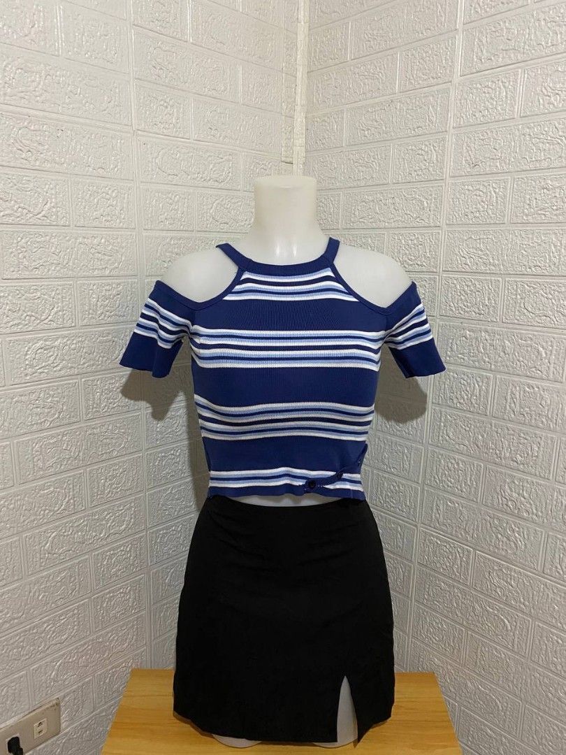 Blue and White Striped Off-Shoulder Top (Category: Blouses) located in Manila. Submitted by leshmode_ig (Listing ID 1437162941, Image 1). Description: - Blue and white striped design - Off-shoulder cut - Short sleeves - Round neckline - Knit fabric - Knot detail at waist - Pairs well with skirts or pants.