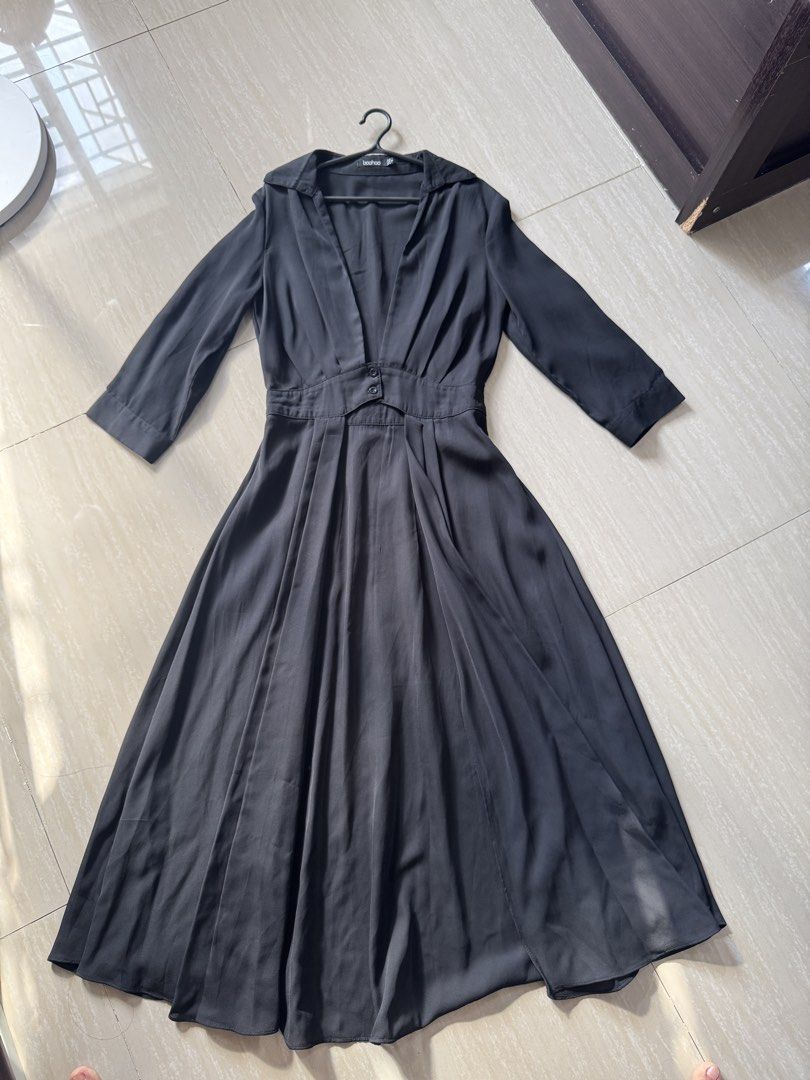 Boohoo Black Midi Dress (Category: Dresses) located in Manila. Submitted by saraho22 (Listing ID 1437096092, Image 1). Description: - Boohoo black midi dress - Collared neckline - Long sleeves - Button closure at waist - Flowing, pleated skirt - Versatile for formal or casual wear.