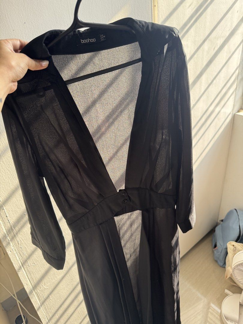 Boohoo Black Midi Dress (Category: Dresses) located in Manila. Submitted by saraho22 (Listing ID 1437096092, Image 3). Description: - Boohoo black midi dress - Collared neckline - Long sleeves - Button closure at waist - Flowing, pleated skirt - Versatile for formal or casual wear.