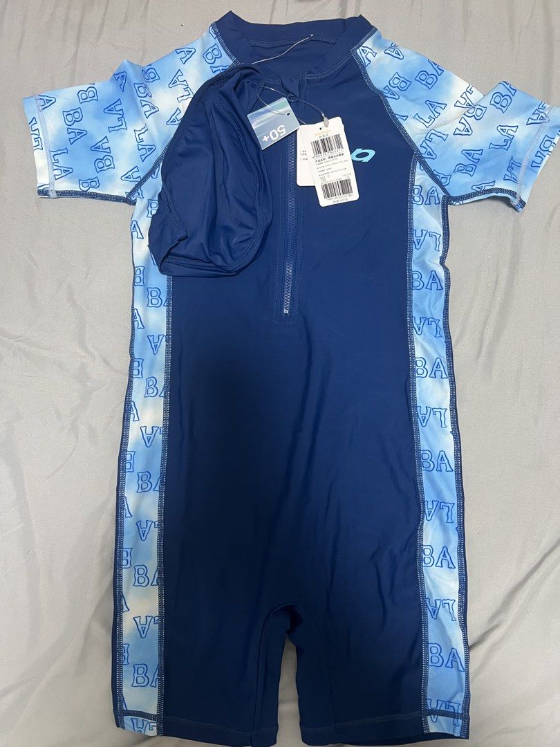 Boys Swim wear with Cap (Category: Babies & Kids Fashion) located in Lipa City. Submitted by ambersnook (Listing ID 1437173127, Image 1). Description: - Brand new with tag - Zip-up front and Short sleeves - Includes matching swim cap - Size 130, size runs small - Could probably fit boys 4-5 years old, depending on body size .