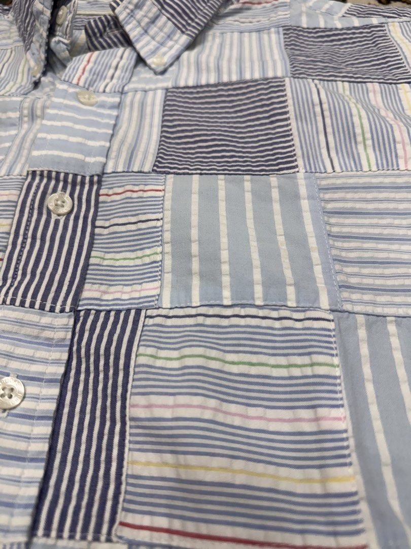 Brooks Brothers Patchwork Seersucker Polo Shirt - Large (Category: Tshirts & Polo Shirts ) located in Manila. Submitted by tropical.ivy_ph (Listing ID 1437116542, Image 2). Description: - Brooks Brothers patchwork seersucker polo shirt - Size: Large - Design: Unique patchwork with blue and white striped patterns - Features: Short sleeves, button-down collar - Made in India - 26 inches pit to pi Pick up: Makati City.