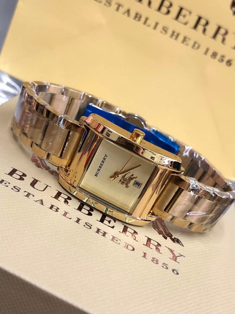 Burberry Gold-tone Square Dial Watch (Category: Women's Watches) located in Makati City. Submitted by bagwatchph (Listing ID 1437069085, Image 1). Description: Authentic-quality watch (not from official store). Brand New 📸 Actual item posted 🚚 Shipping via J&T Express or Lalamove/Grab (scheduled pick-up) DM to order or inquire..