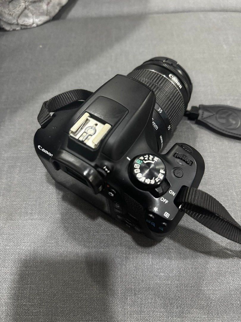 Canon DSLR Camera with Lens (Category: Cameras) located in Manila. Submitted by shap0 (Listing ID 1437129397, Image 1). Description: - Canon DSLR camera - Includes lens and cap - Comes with a camera strap (not original) - comes with camera bag (one side of the strap is broken - only flaw (missing port cover on side) .