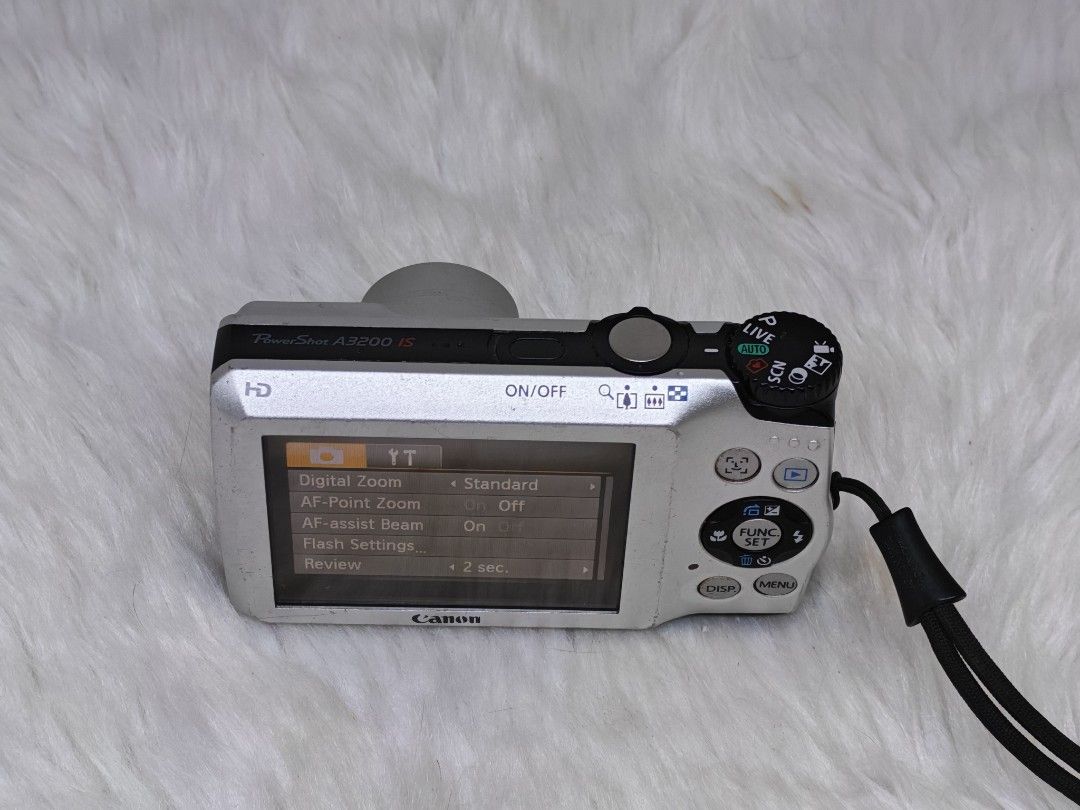Canon PowerShot A3200 IS Digital Camera (Category: Cameras) located in Manila. Submitted by ultimogizmos (Listing ID 1437074827, Image 3). Description: - Canon PowerShot A2500 IS Digital Camera - 14.1 Megapixel Resolution - 5x Optical Zoom Lens (50-25.0mm) - Aperture: f/2.8-6.9 - Features: Digital Zoom, AF-Point Zoom, AF-Assist Beam, Flash Settings - LCD Screen for easy photo review excellent working conditions no issues actual and sample pics po