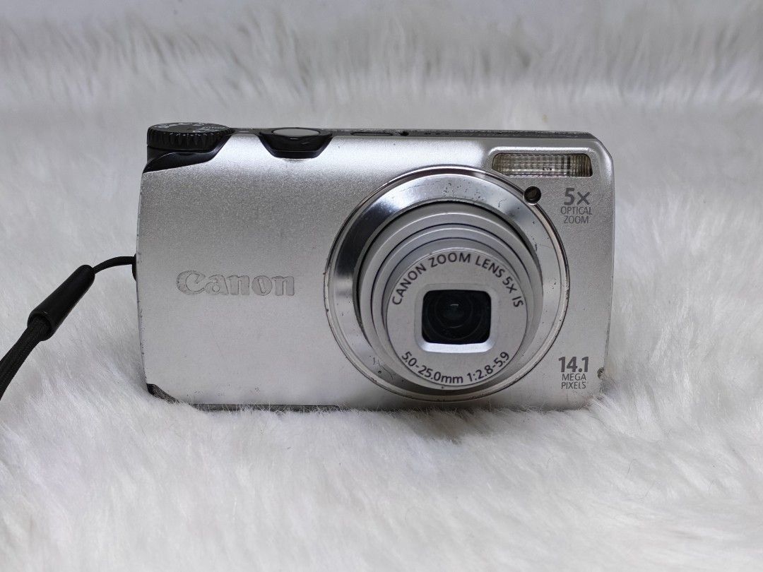 Canon PowerShot A3200 IS Digital Camera (Category: Cameras) located in Manila. Submitted by ultimogizmos (Listing ID 1437074827, Image 1). Description: - Canon PowerShot A2500 IS Digital Camera - 14.1 Megapixel Resolution - 5x Optical Zoom Lens (50-25.0mm) - Aperture: f/2.8-6.9 - Features: Digital Zoom, AF-Point Zoom, AF-Assist Beam, Flash Settings - LCD Screen for easy photo review excellent working conditions no issues actual and sample pics po