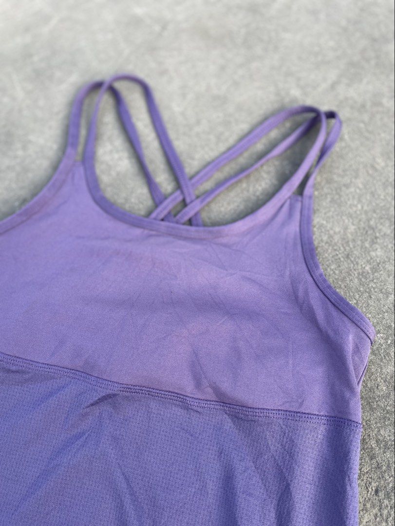 Champion Purple Tank Top M/M (Category: Sleeveless) located in Makati City. Submitted by kayecheng (Listing ID 1437152005, Image 2). Description: Champion purple tank top, size M/M. Criss-cross back, cinched bottom, and built-in bra. Breathable fabric, ideal for workouts or casual wear..