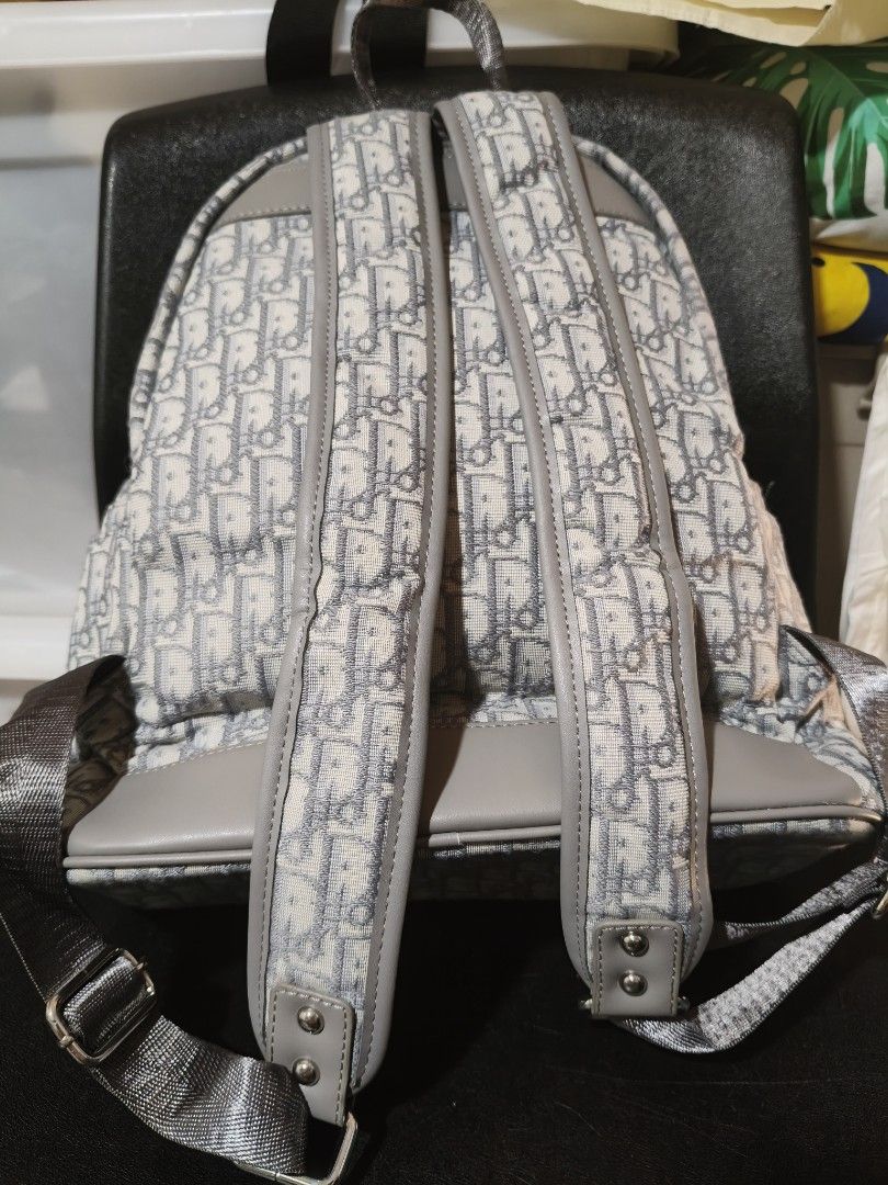 Christian Dior Oblique Backpack (Category: Luxury Bags & Wallets) located in Manila. Submitted by 8chay (Listing ID 1437017469, Image 2). Description: - Authentic Christian Dior Oblique Backpack - Features the iconic Oblique pattern - Top handle and adjustable shoulder straps - 'Christian Dior Paris' band on front - Includes a small charm on the zipper - Padded back straps for comfort.