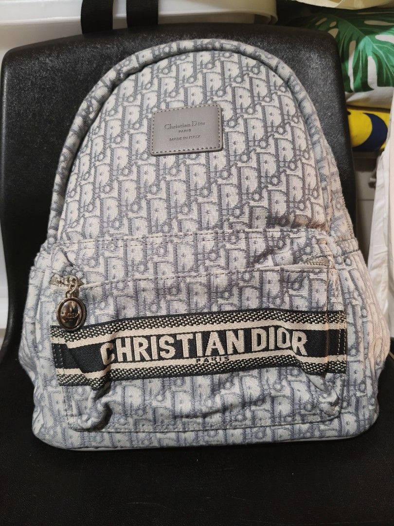 Christian Dior Oblique Backpack (Category: Luxury Bags & Wallets) located in Manila. Submitted by 8chay (Listing ID 1437017469, Image 1). Description: - Authentic Christian Dior Oblique Backpack - Features the iconic Oblique pattern - Top handle and adjustable shoulder straps - 'Christian Dior Paris' band on front - Includes a small charm on the zipper - Padded back straps for comfort.