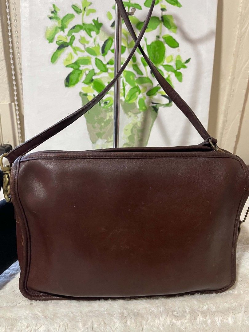 Coach Vintage Sling Bag Original (Category: Luxury Bags & Wallets) located in Naawan. Submitted by twillycalledprelovedbags (Listing ID 1437103505, Image 3). Description: issue repaint, may rubs sa edge - talon zipper, made in United States.
