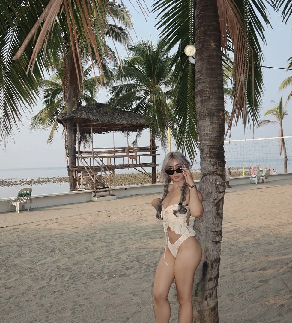 Cream Aesthetic Two piece Swimsuit (Category: Bikinis & Swimsuits) located in Manila. Submitted by lalala015 (Listing ID 1437202907, Image 2). Description: - Cream-colored two-piece swimsuit - Halter top with fringe detailing - Matching high-cut bottom - Made of soft, lightweight fabric - Flattering and comfortable design - Ideal for beach or poolside.