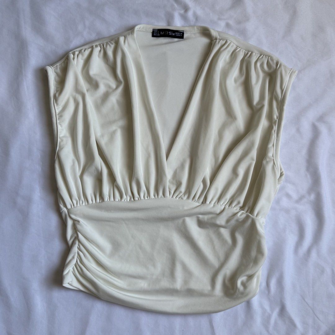 Cream Ruched Top (Category: Shirts) located in Santa Rosa. Submitted by kristianac (Listing ID 1437147306, Image 1). Description: fits s-m.