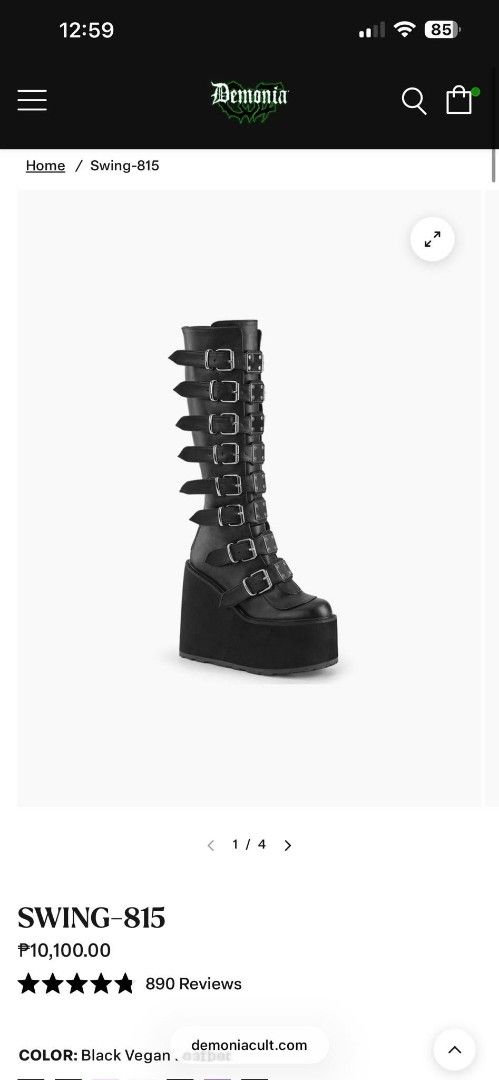 Demonia Swing-815 Black Vegan Boots (Category: Boots) located in Cebu City. Submitted by books4less (Listing ID 1437039679, Image 2). Description: - Demonia Swing-815 boots - Black vegan leather - Knee-high design - Chunky platform sole - Multiple straps with silver buckles - Stylish and edgy.