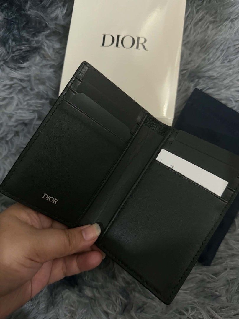 Dior Black Leather Card Case (Category: Luxury Bags & Wallets) located in Pasig City. Submitted by prettydarla (Listing ID 1437063149, Image 3). Description: - Authentic Dior complimentary from Dior Paris Parfum - Soft Calf Black leather - Features CD logo - New - Includes original box and dust bag.