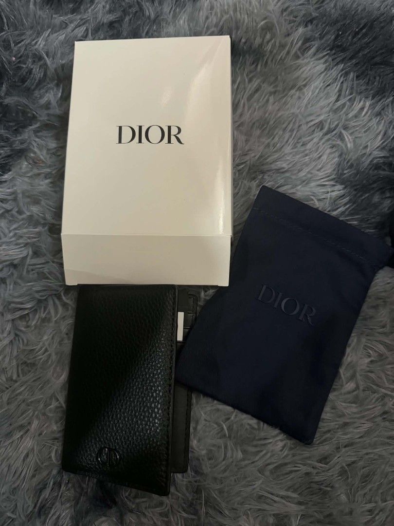 Dior Black Leather Card Case (Category: Luxury Bags & Wallets) located in Pasig City. Submitted by prettydarla (Listing ID 1437063149, Image 2). Description: - Authentic Dior complimentary from Dior Paris Parfum - Soft Calf Black leather - Features CD logo - New - Includes original box and dust bag.