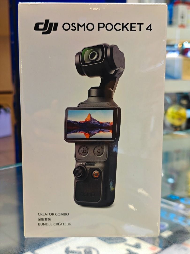 DJI Osmo Pocket 4 Creator Combo (Category: Cameras) located in Quezon City. Submitted by imax12345 (Listing ID 1437105313, Image 1). Description: - DJI Osmo Pocket 4 Creator Combo - Compact and portable handheld camera - Features a built-in screen and control buttons - 'Creator Combo' indicates additional accessories included - Perfect for content creators.
