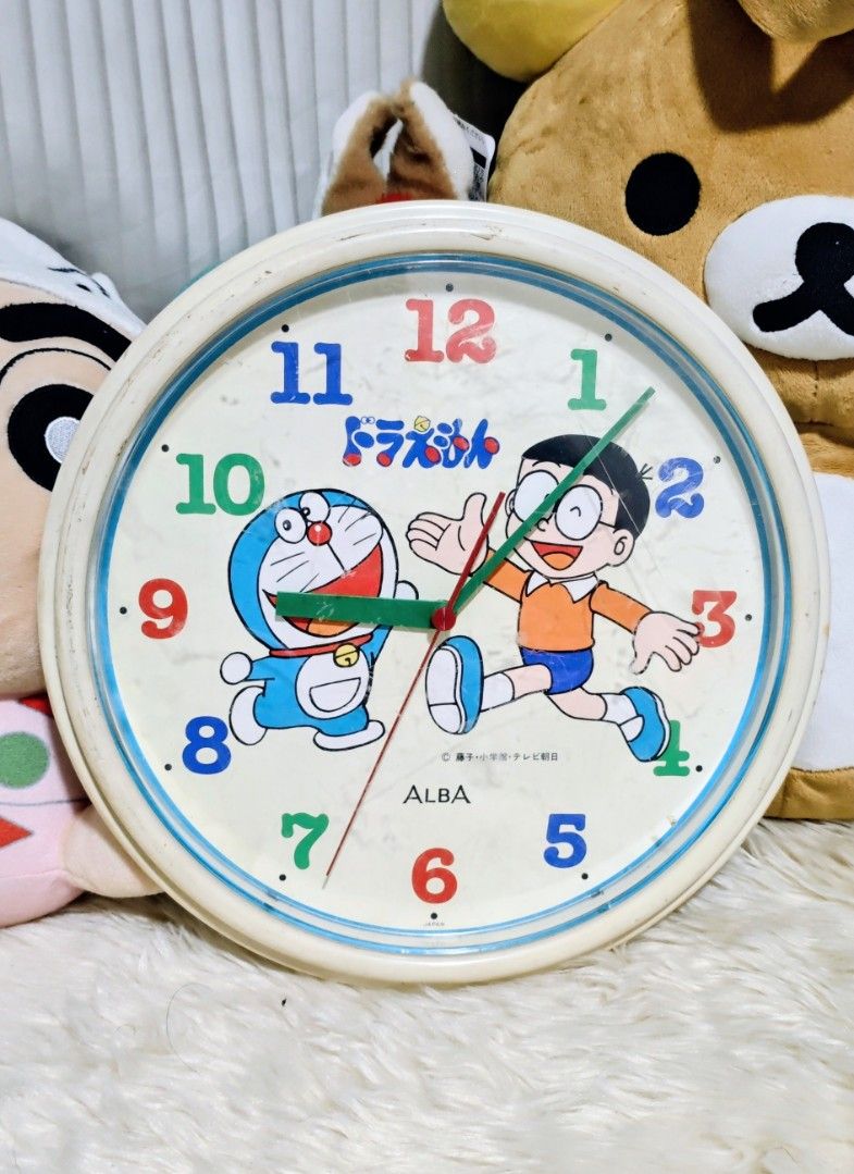 DORAEMON with Nobita Wall Clock (Category: Clocks) located in Manila. Submitted by yourfavoritethings7 (Listing ID 1437111308, Image 1). Description: Tested: Working 10.5 x 10.5 i ches.