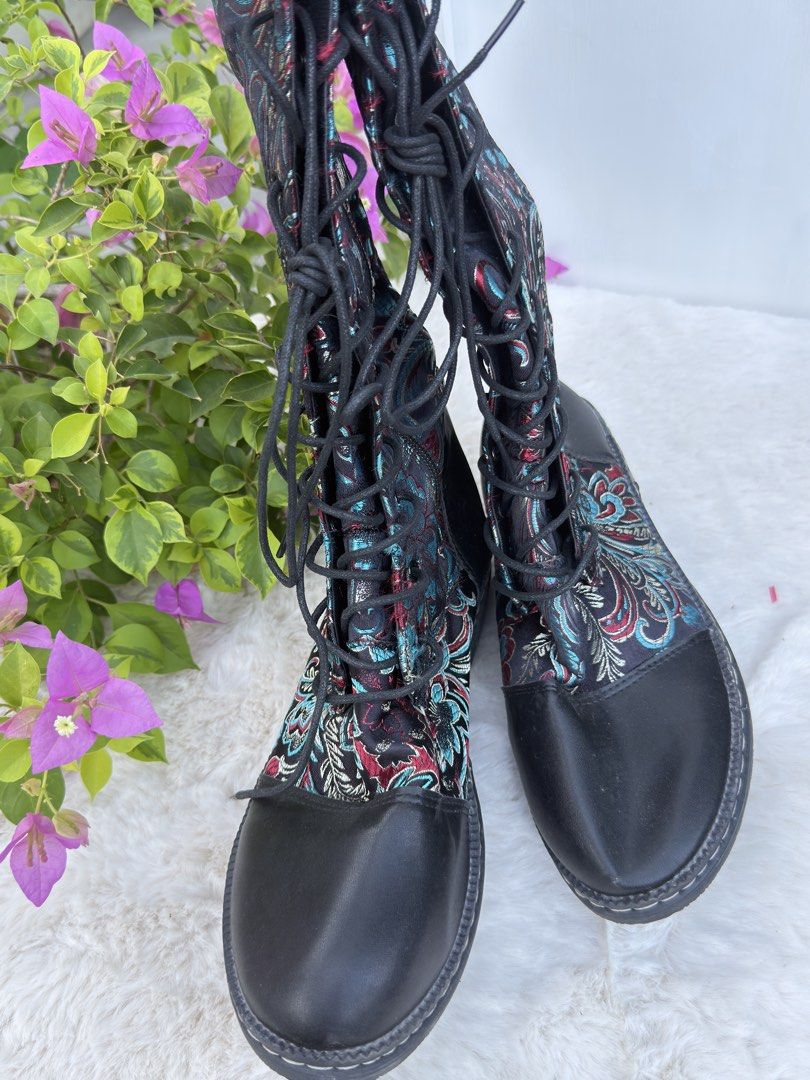 Embroidered Lace-Up Boots Size 43 (Category: Boots) located in Angeles City. Submitted by delle_25 (Listing ID 1437203863, Image 3). Description: - Black lace-up boots - Embroidered floral pattern - Size 43 - Unique design with mixed colors and textures - Well-maintained condition.