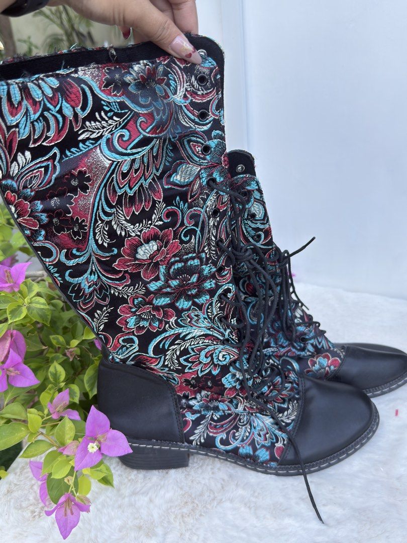 Embroidered Lace-Up Boots Size 43 (Category: Boots) located in Angeles City. Submitted by delle_25 (Listing ID 1437203863, Image 2). Description: - Black lace-up boots - Embroidered floral pattern - Size 43 - Unique design with mixed colors and textures - Well-maintained condition.