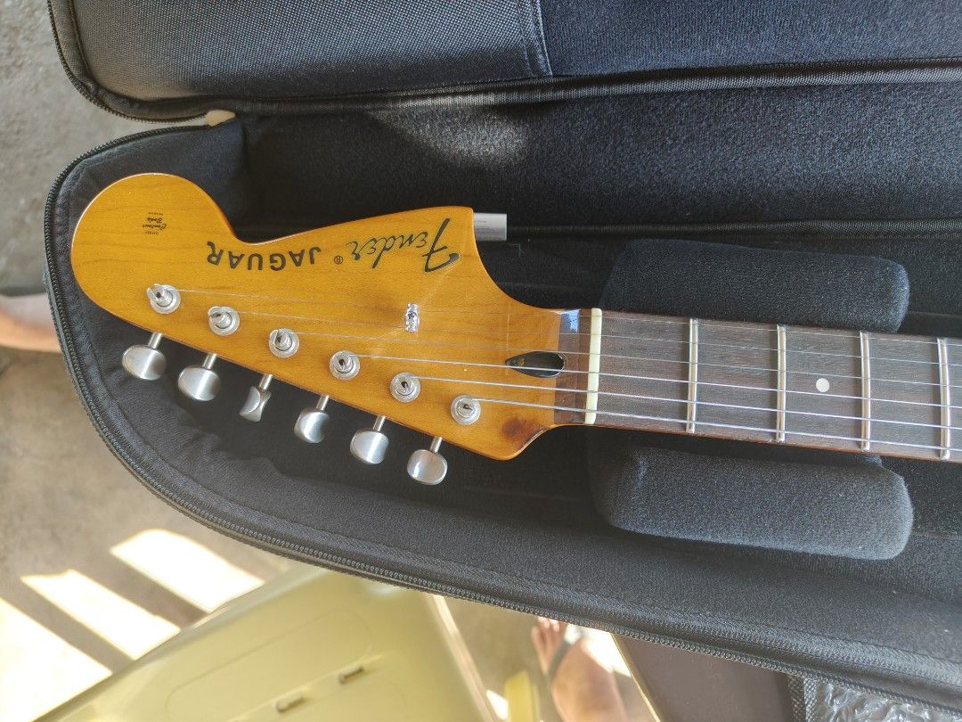 Fender Jaguar Special HH Electric Guitar (Category: Musical Instruments) located in Santiago. Submitted by lester_bolisay_09264655959 (Listing ID 1437156089, Image 3). Description: - Fender Jaguar electric guitar - Cream body with tortoiseshell pickguard - Two pickups - Tremolo system - Fender logo on headstock - Includes hard case - Made in Japan neck - We Accept Credit Card Payment.